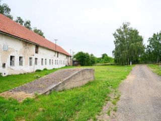 Chlév s pozemkem v obci Mančice
